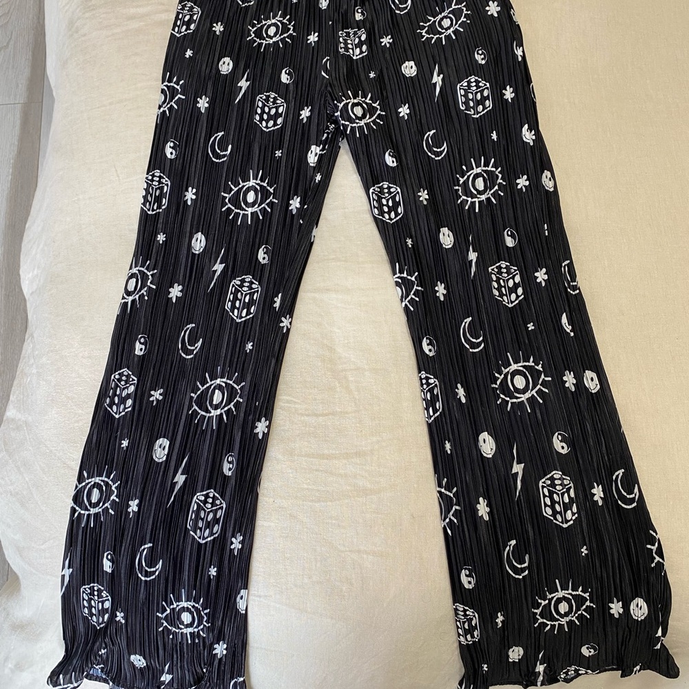 Dressed in LALA Plisse Pants in What’s Your Sign